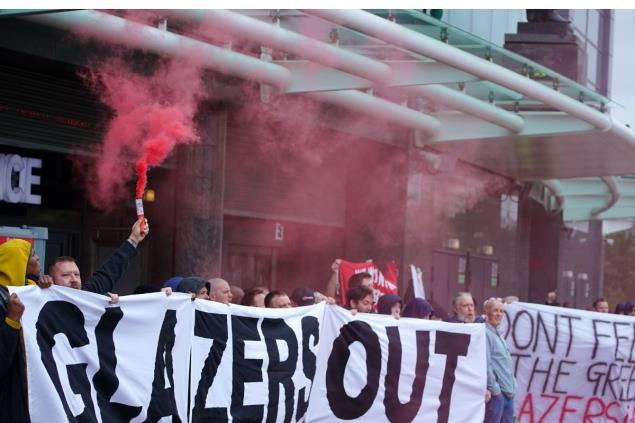 Manchester United Fans Protest Against Owners on Day of Kit Launch Outside Adidas Megastore