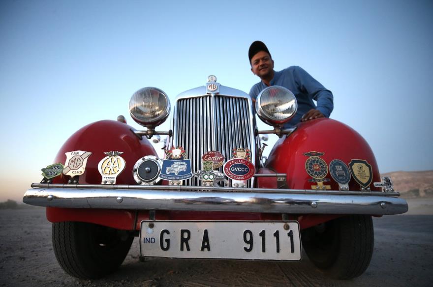 Indian businessperson Daman Thakore poses with his 1950 model classic car called &quot;Lal Pari,&quot; Cappadocia, Türkiye, Sept. 26, 2023. (AA Photo)